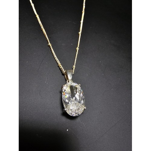 195 - An pretty 925 silver large faceted crystal pendant on an attractive 18