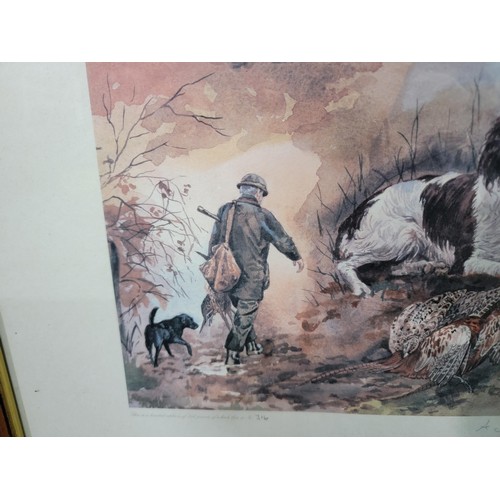 122 - 2x framed and glazed limited edition pictures inc  a Spaniel hunt scene 