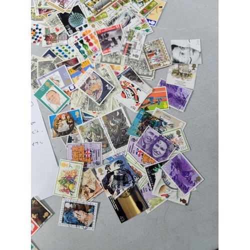 123 - Large quantity of loose British commemorative stamps collected over many years, most are used with a... 