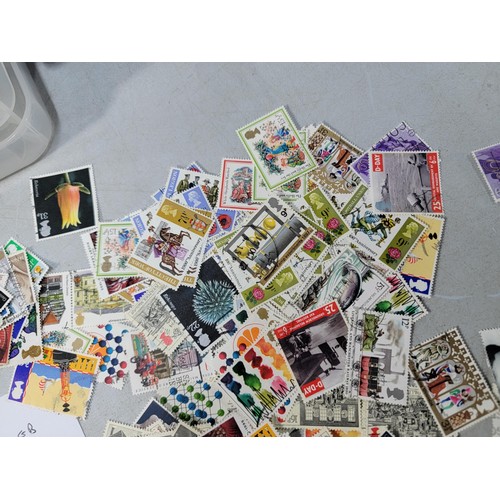 123 - Large quantity of loose British commemorative stamps collected over many years, most are used with a... 