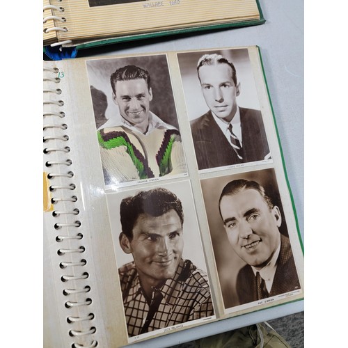 126 - 2x green albums containing a large quantity of Hollywood stars of the past inc Robert Kent, Dick Pow... 