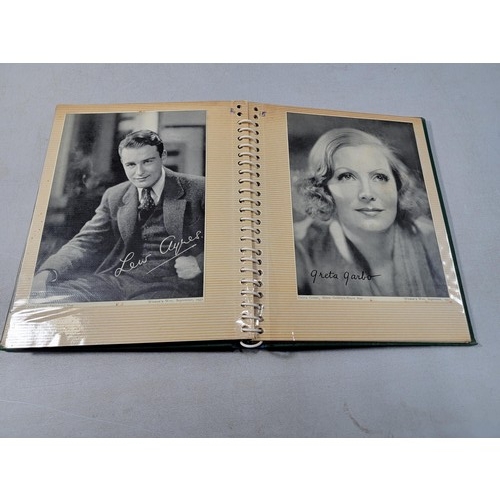 126 - 2x green albums containing a large quantity of Hollywood stars of the past inc Robert Kent, Dick Pow... 