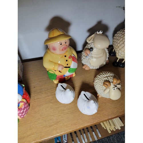 132 - Quantity of collectables inc 3x ceramic piggy banks, 1 is a vintage treacle glazed one along with 6x... 