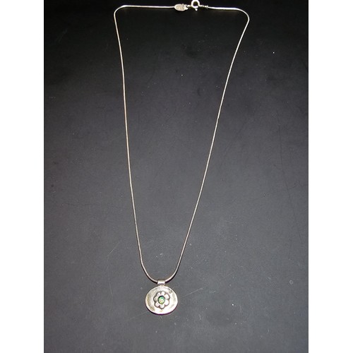 216 - A pretty 925 silver necklace and pendant by Pia, the pendant has a flower design inset with a beauti... 