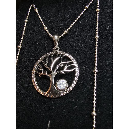 217 - A brand new pretty 925 silver tree of life pendant set on an attractive 18