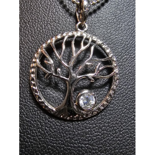 217 - A brand new pretty 925 silver tree of life pendant set on an attractive 18