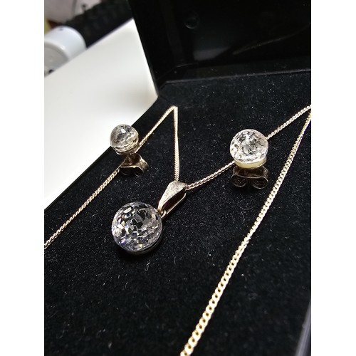 218 - A 925 silver matching jewellery set to include a pendant, chain and matching stud earrings, all with... 