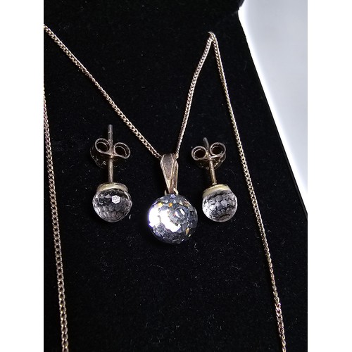 218 - A 925 silver matching jewellery set to include a pendant, chain and matching stud earrings, all with... 