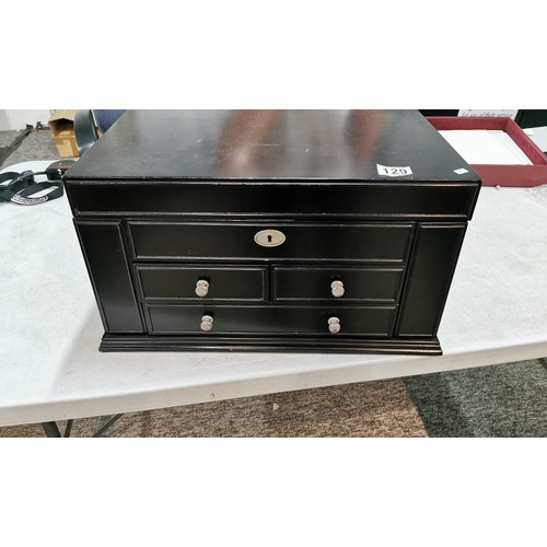 129 - Large black wooden jewellery box opens to revel mirrored back, compartments to the inside, two swing... 