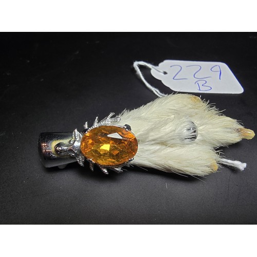 229B - A collection of 4x Scottish genuine grouse foot brooches all of a similar design featuring a stags h... 