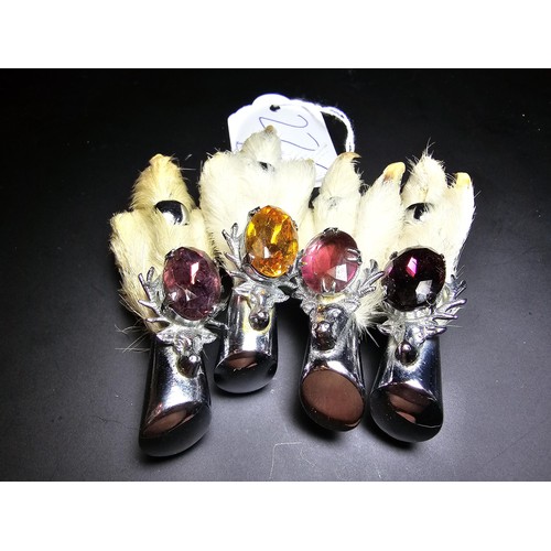 229B - A collection of 4x Scottish genuine grouse foot brooches all of a similar design featuring a stags h... 