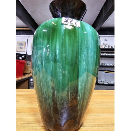 277 - A large impressive terracotta vase with a green and black glaze having a nice lustre by Blue Mountai... 