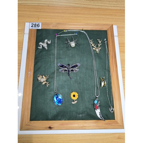 286 - A good suite of various costume jewellery, the cushioned display board is included which includes a ... 