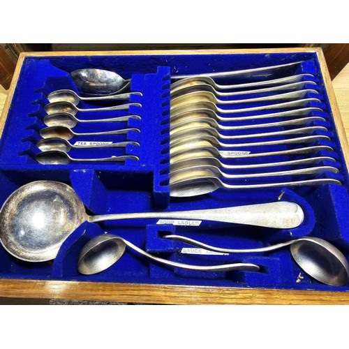 292 - A fine quality and impressive oak cased canteen of cutlery for 12 places by Walker & Hall, all but t... 