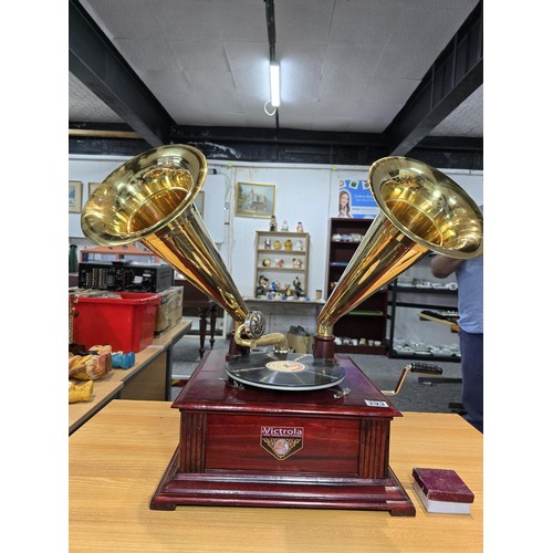 293 - An unusual rare reproduction twin brass horn Victrola gramophone featuring 2 large brass horns, the ... 