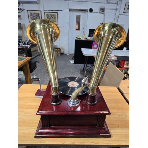 293 - An unusual rare reproduction twin brass horn Victrola gramophone featuring 2 large brass horns, the ... 