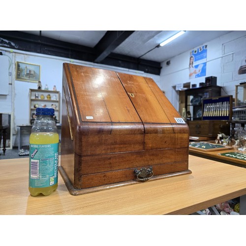 295 - A good quality solid mahogany stationary cabinet of grand proportions which has 2 sloping opening do... 