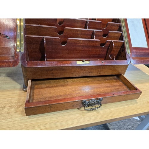 295 - A good quality solid mahogany stationary cabinet of grand proportions which has 2 sloping opening do... 