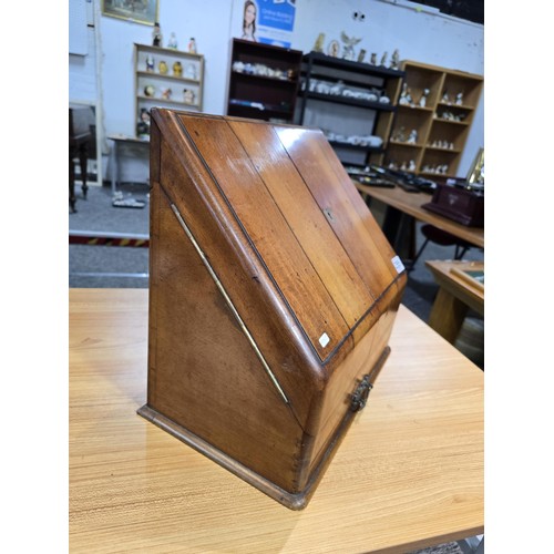 295 - A good quality solid mahogany stationary cabinet of grand proportions which has 2 sloping opening do... 