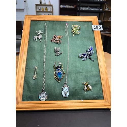 290 - A good display board of costume jewellery, (display board is included) which includes an ornate jewe... 