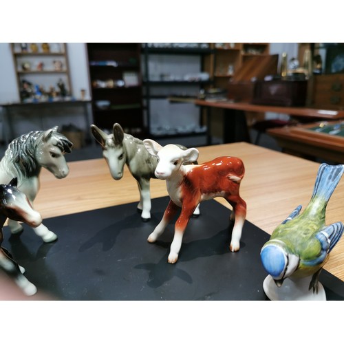 294 - A collection of 7x porcelain animal figures from various makers which includes Beswick, Goebel, H-O ... 