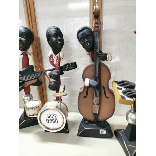 68 - A good quality complete 8 piece resin jazz band statue figure set by J.V. Furniture, inc a double ba... 