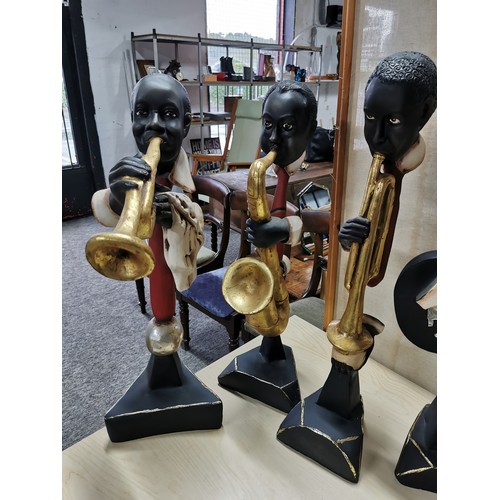 68 - A good quality complete 8 piece resin jazz band statue figure set by J.V. Furniture, inc a double ba... 