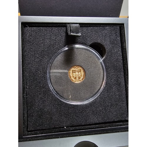 207 - A brand new and boxed gold proof quarter sovereign  2023 for King Charles III Coronation, the presen... 