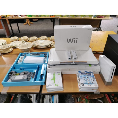 5 - Nintendo Wii games console with two controllers, Wii Fit board and 7x games, and accessories, steeri... 