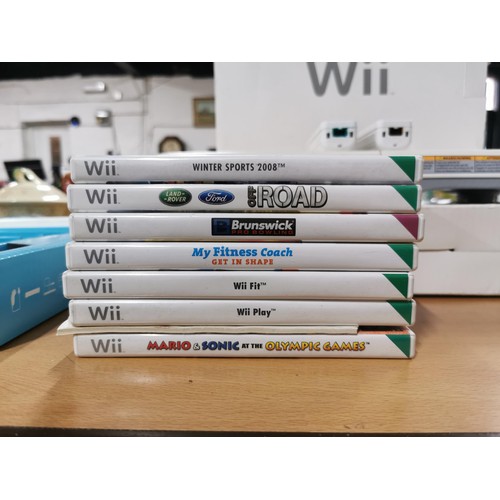 5 - Nintendo Wii games console with two controllers, Wii Fit board and 7x games, and accessories, steeri... 