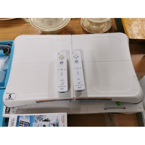 5 - Nintendo Wii games console with two controllers, Wii Fit board and 7x games, and accessories, steeri... 