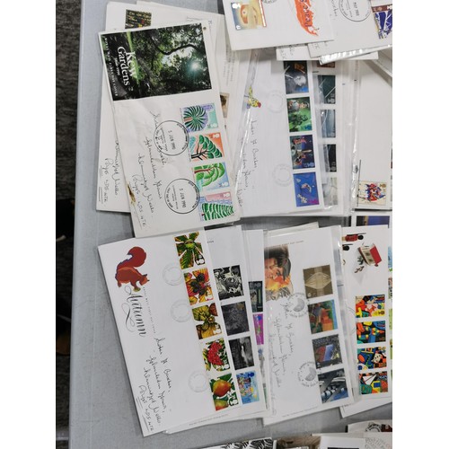 14 - Large qty of first day covers with stamps attached, all appear to be British.