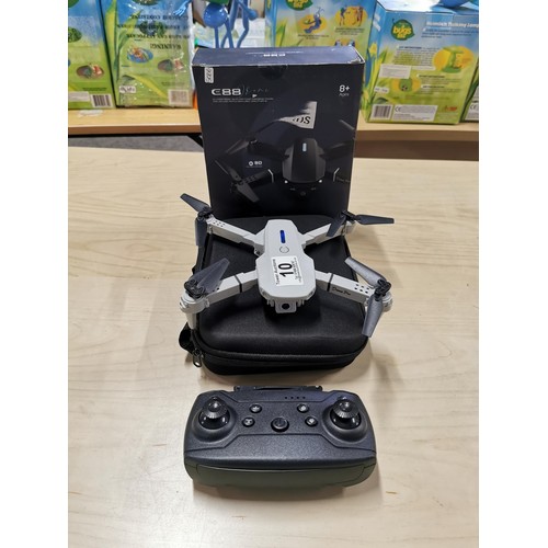 10 - E88 SD Camera Drone, complete with controller original box. As new condition.