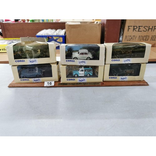 16 - Collection of 6x various Morris Minor Corgi diecast model cars in original boxes along with a wooden... 