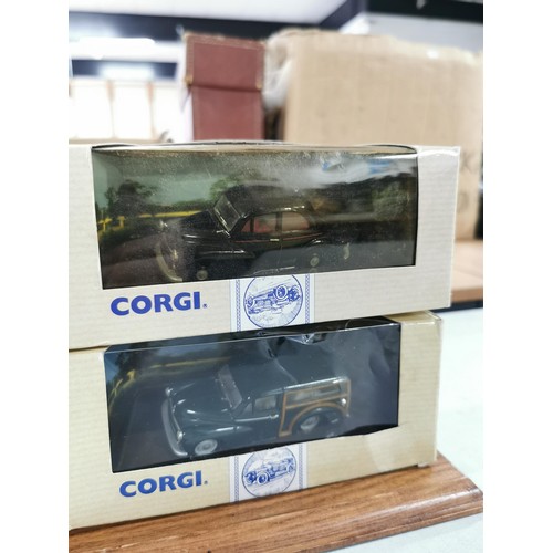 16 - Collection of 6x various Morris Minor Corgi diecast model cars in original boxes along with a wooden... 