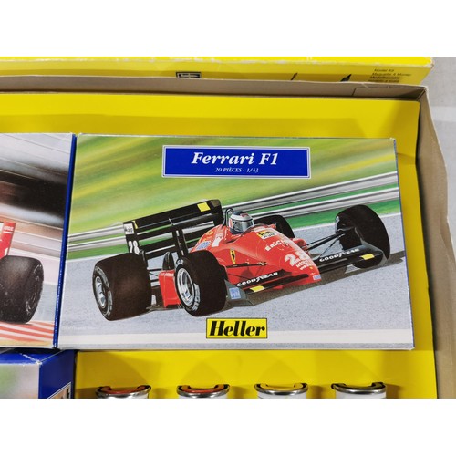 15 - Heller Collection model kits set of 3x boxed F1 model cars, along with paints and brushes, appears u... 