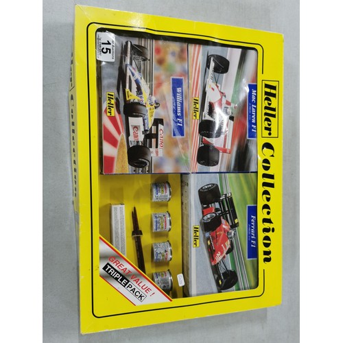 15 - Heller Collection model kits set of 3x boxed F1 model cars, along with paints and brushes, appears u... 