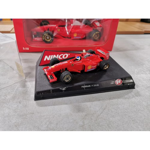 18 - Ferrari F 310B diecast model F1 car, scale 1:18 in original box, along with smaller scale NINCO Ferr... 