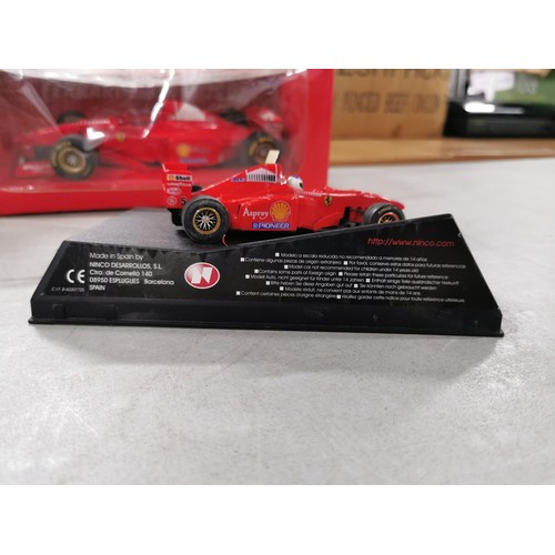 18 - Ferrari F 310B diecast model F1 car, scale 1:18 in original box, along with smaller scale NINCO Ferr... 