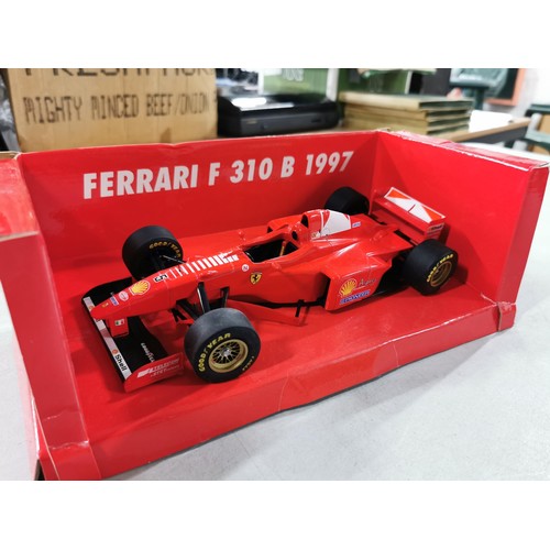 18 - Ferrari F 310B diecast model F1 car, scale 1:18 in original box, along with smaller scale NINCO Ferr... 