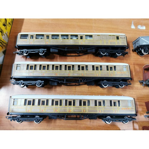 20 - Qty of model railways items to include locomotives, cars, rolling stock, coaches, train controller e... 