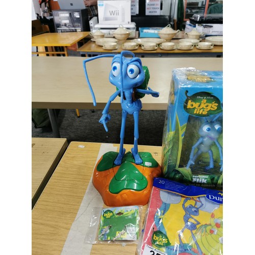 25 - Qty of retro A Bug's Life collectable items to include action figures some in original boxes, books,... 