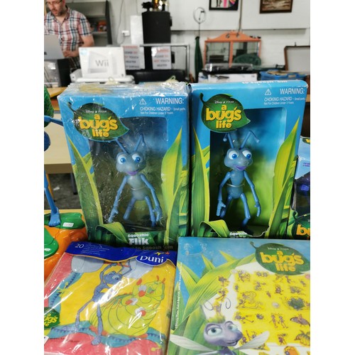 25 - Qty of retro A Bug's Life collectable items to include action figures some in original boxes, books,... 