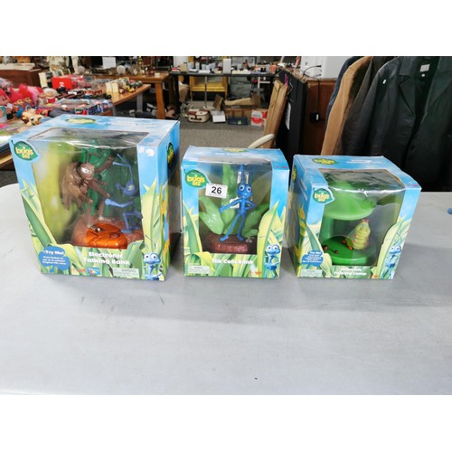 26 - 3x boxed and unused collectable A Bug's Life items to include Flik Coin Bank, Heimlich talking lamp ... 