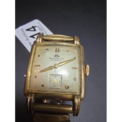 214 - A good quality vintage Bucherer 15 jewel mechanical wrist watch having a gold filled strap and a goo... 