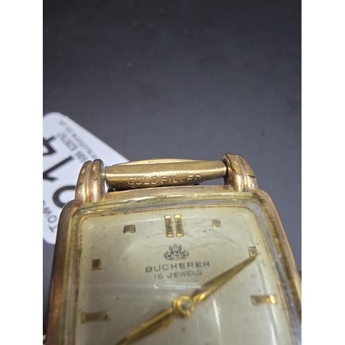 214 - A good quality vintage Bucherer 15 jewel mechanical wrist watch having a gold filled strap and a goo... 