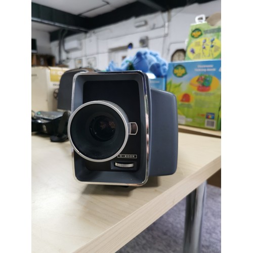 35 - Chinon C-200S Dual 8mm projector boxed complete with projector screen and accessories. Unused film, ... 