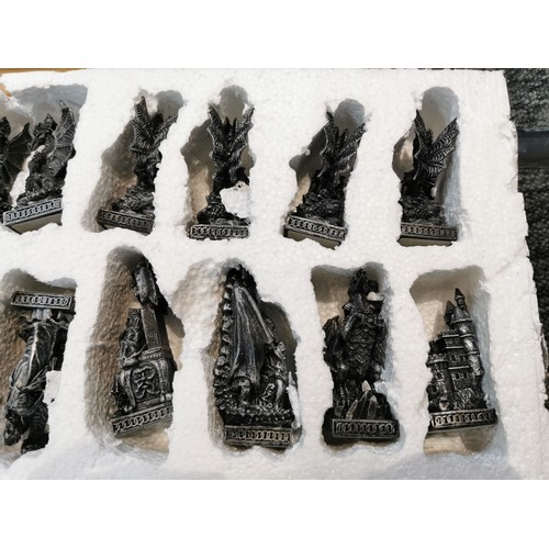 41 - A boxed Dragons of the realm The ultimate fantasy chess set which is fully complete, comes with impr... 