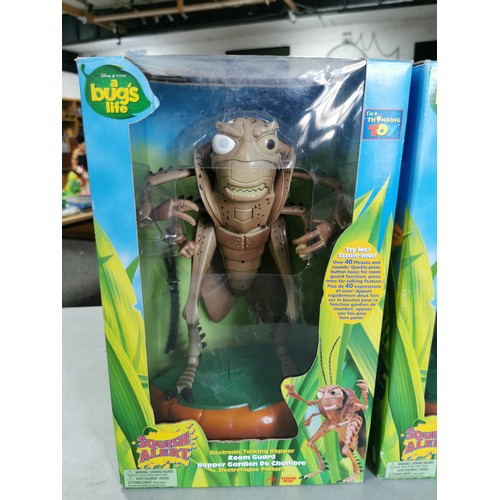 31 - A pair of collectable A Bugs life boxed and unused electronic talking Hopper figures.