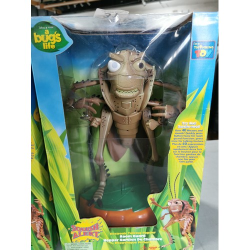 31 - A pair of collectable A Bugs life boxed and unused electronic talking Hopper figures.